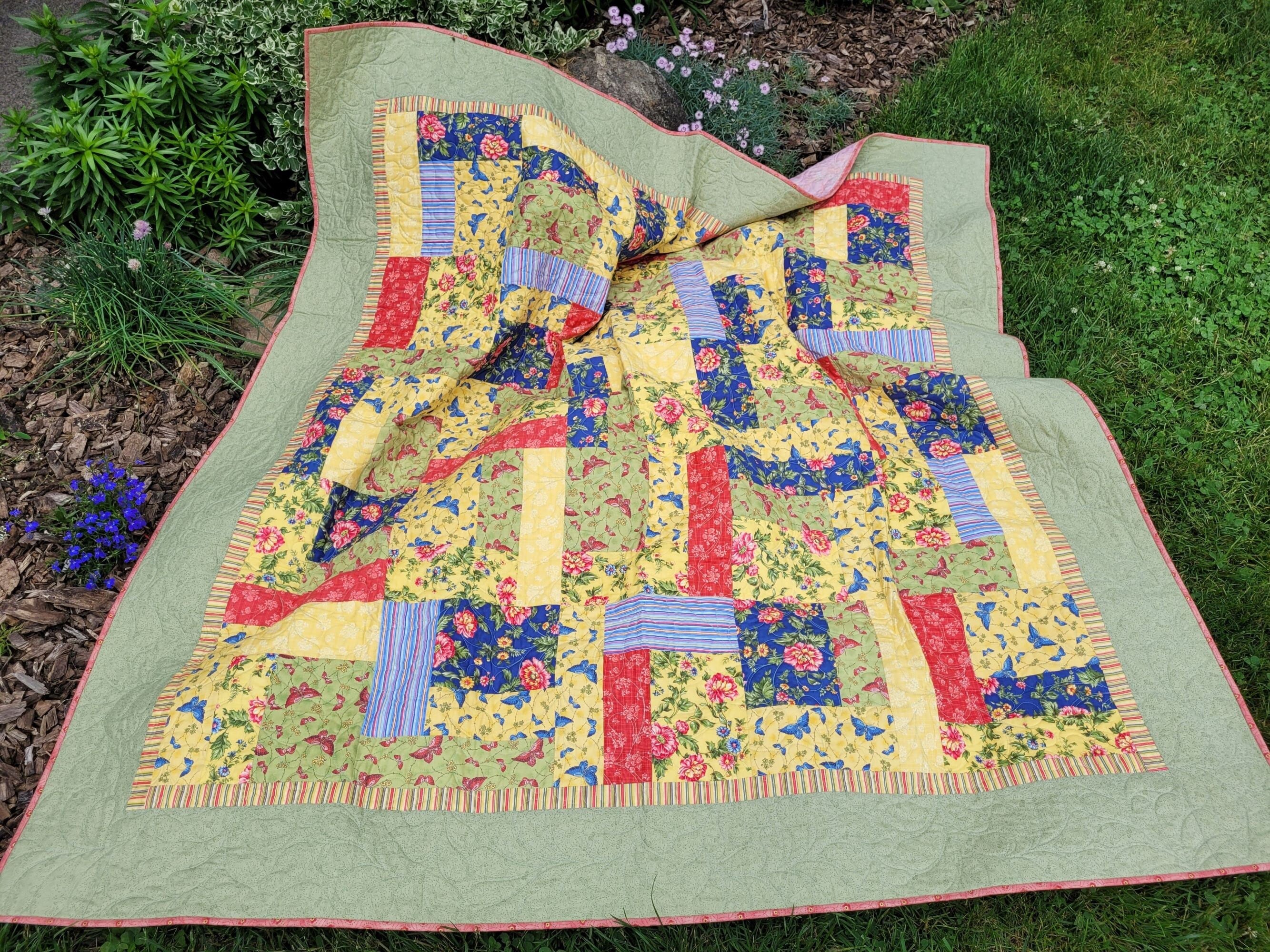 summer quilt with butterflies and flowers