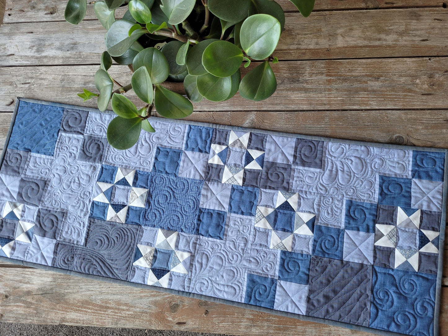 quilted table runner in blue and grey