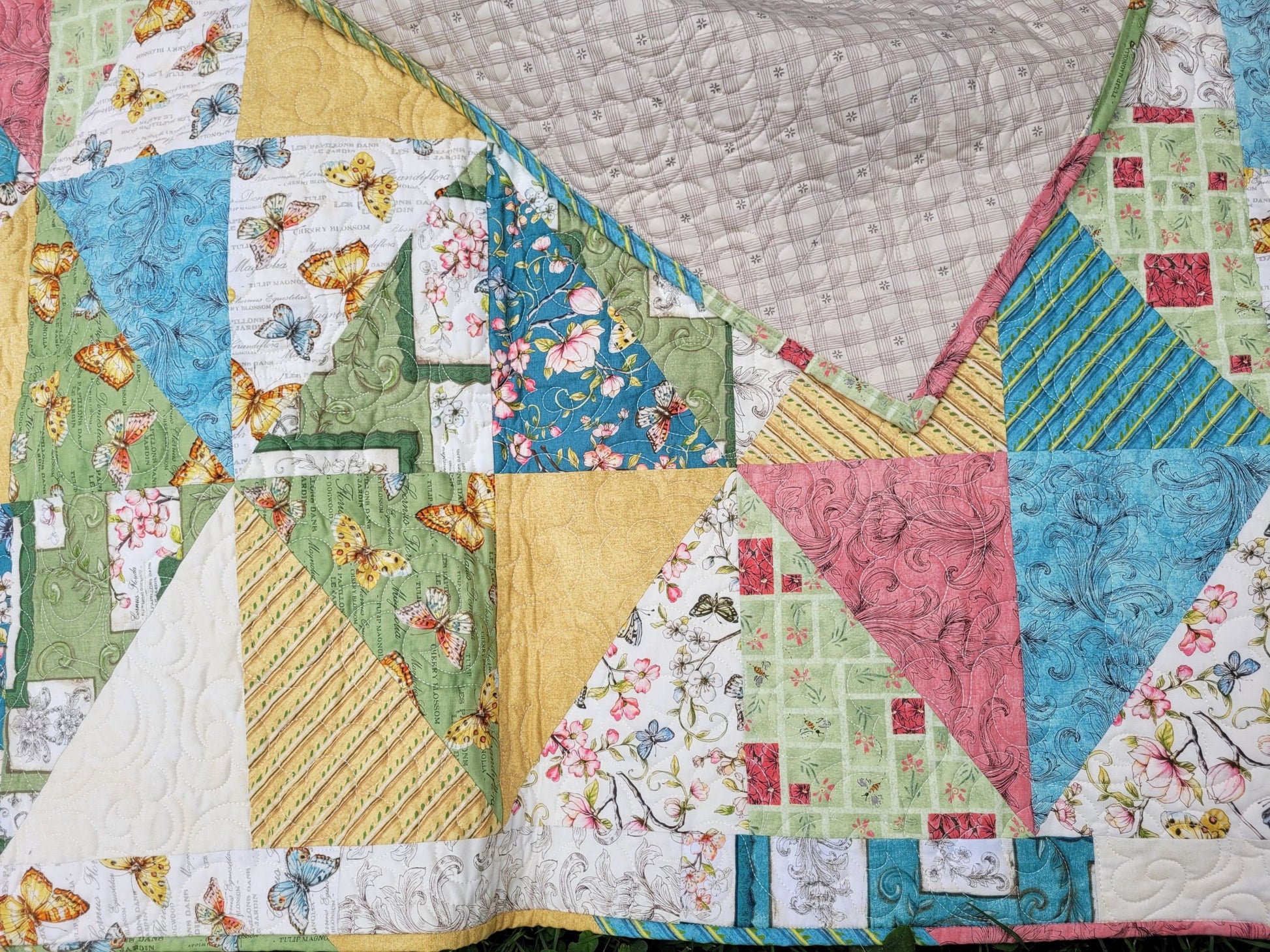 butterfly theme quilt showing backing
