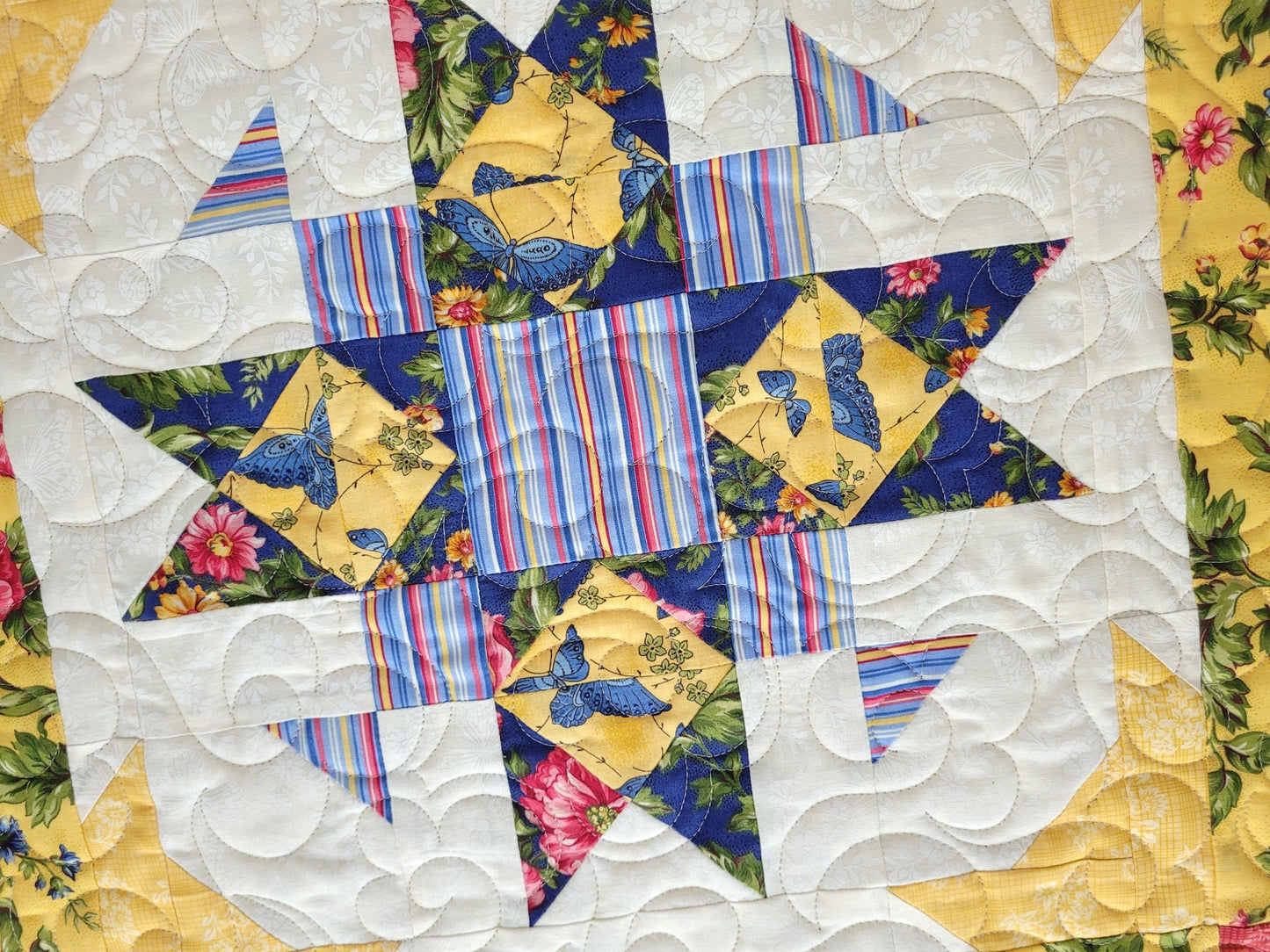 star quilt for table with blue butterflies