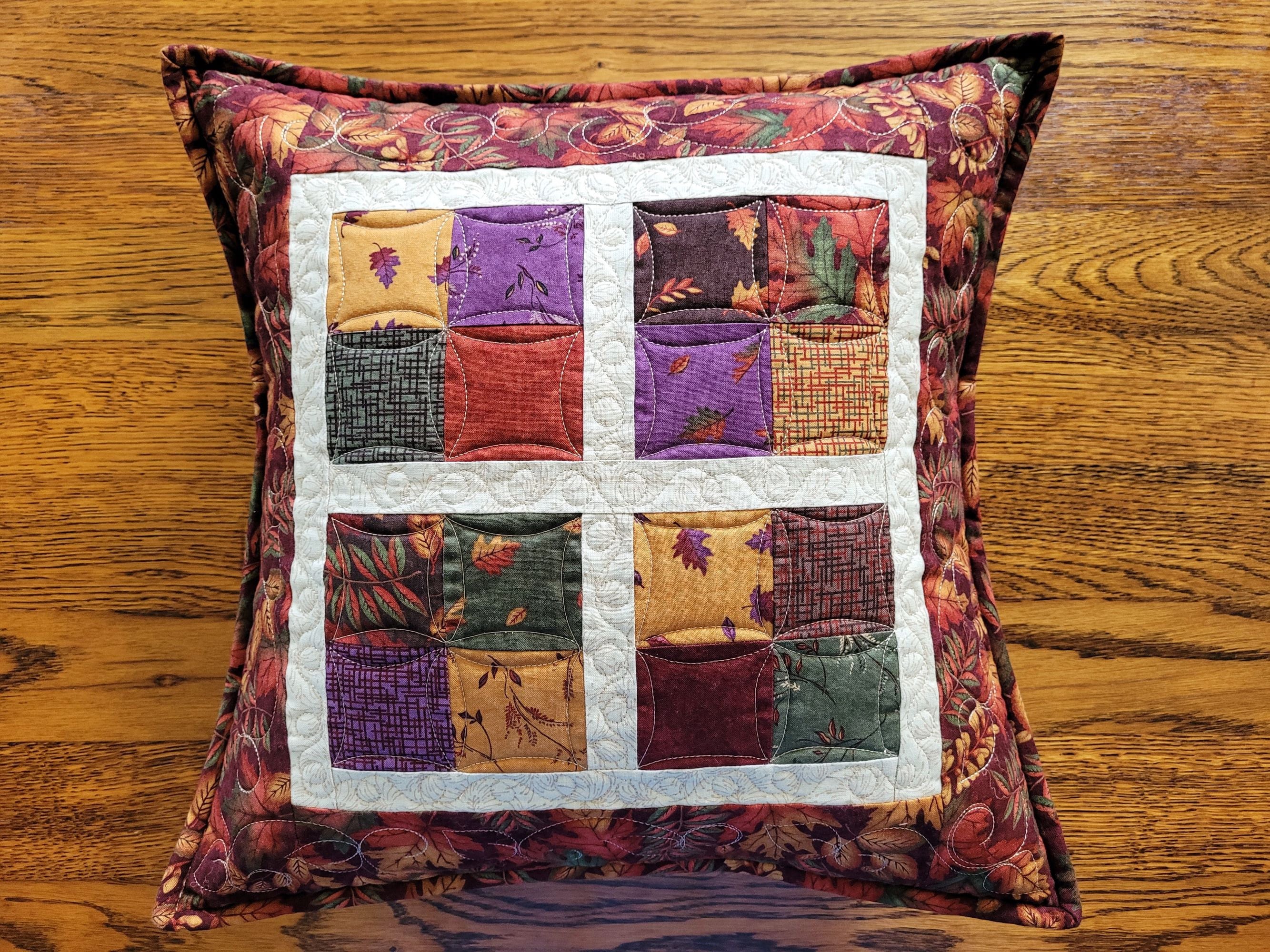 autumn leaves quilted cushion