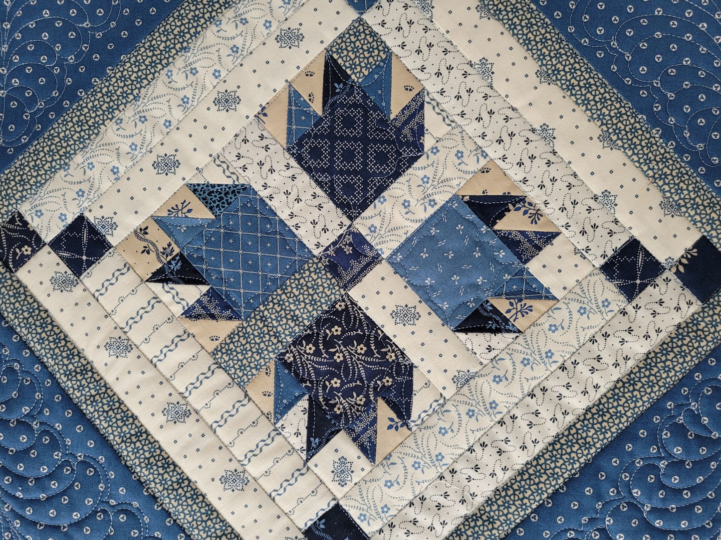 bear claw quilt in blue and cream