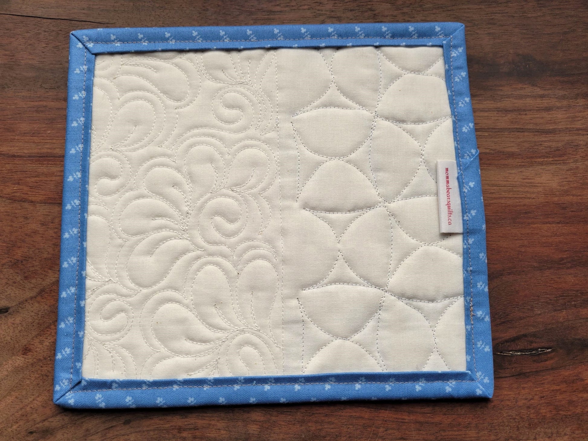 showing a sample of the back of a quilt