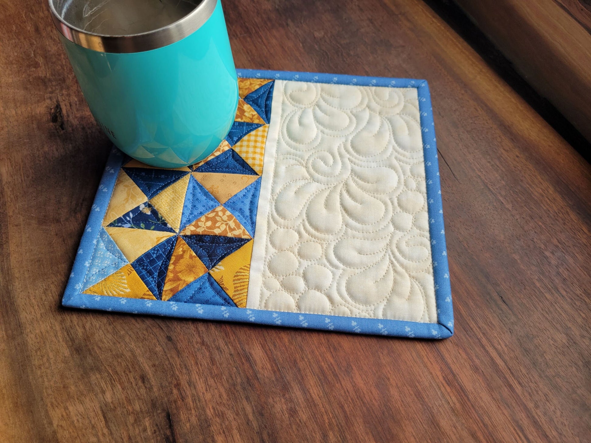 blue and gold patchwork mini quilt