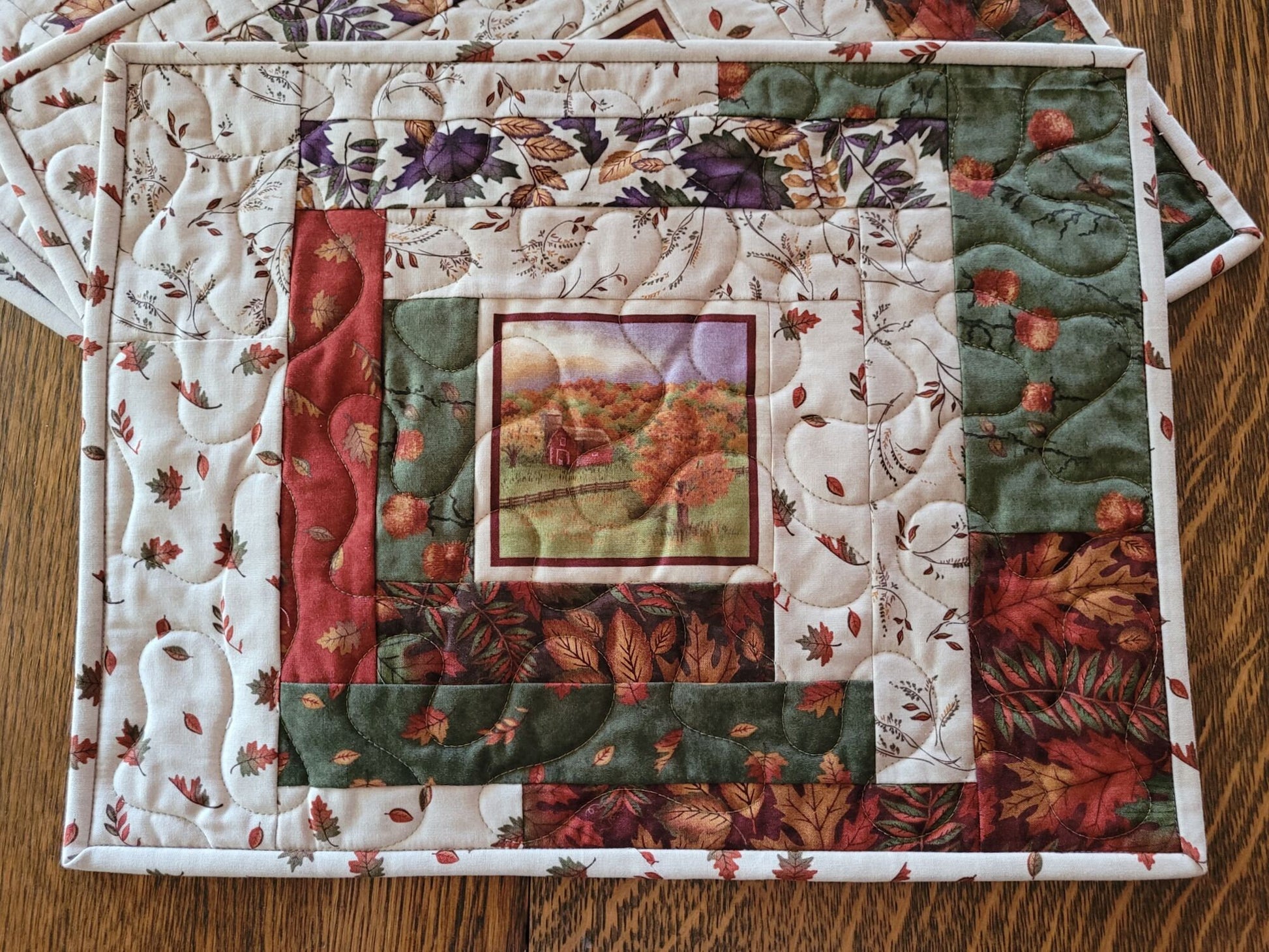 fall farm scene on scrap quilt table mat