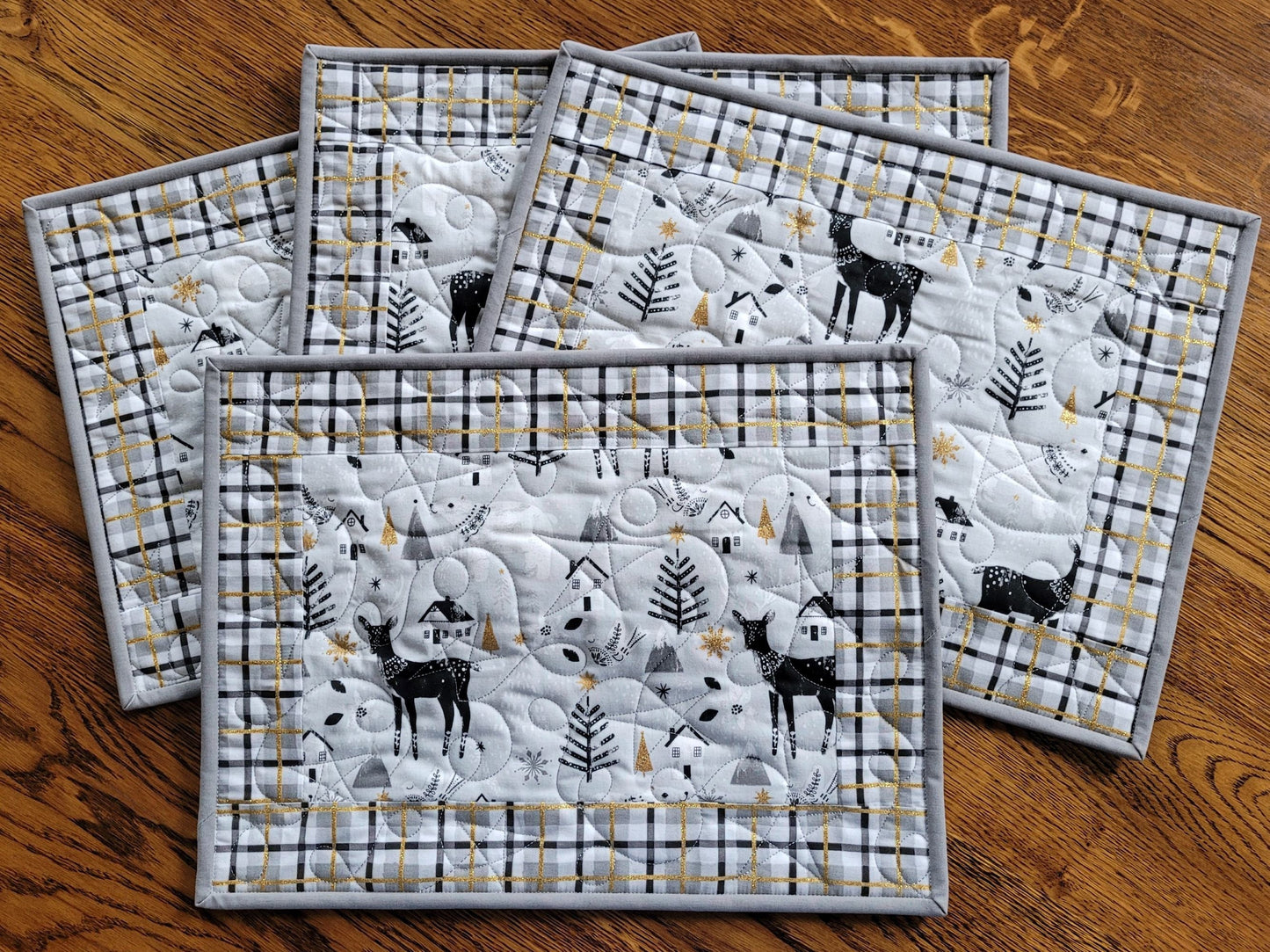 four quilted placemats