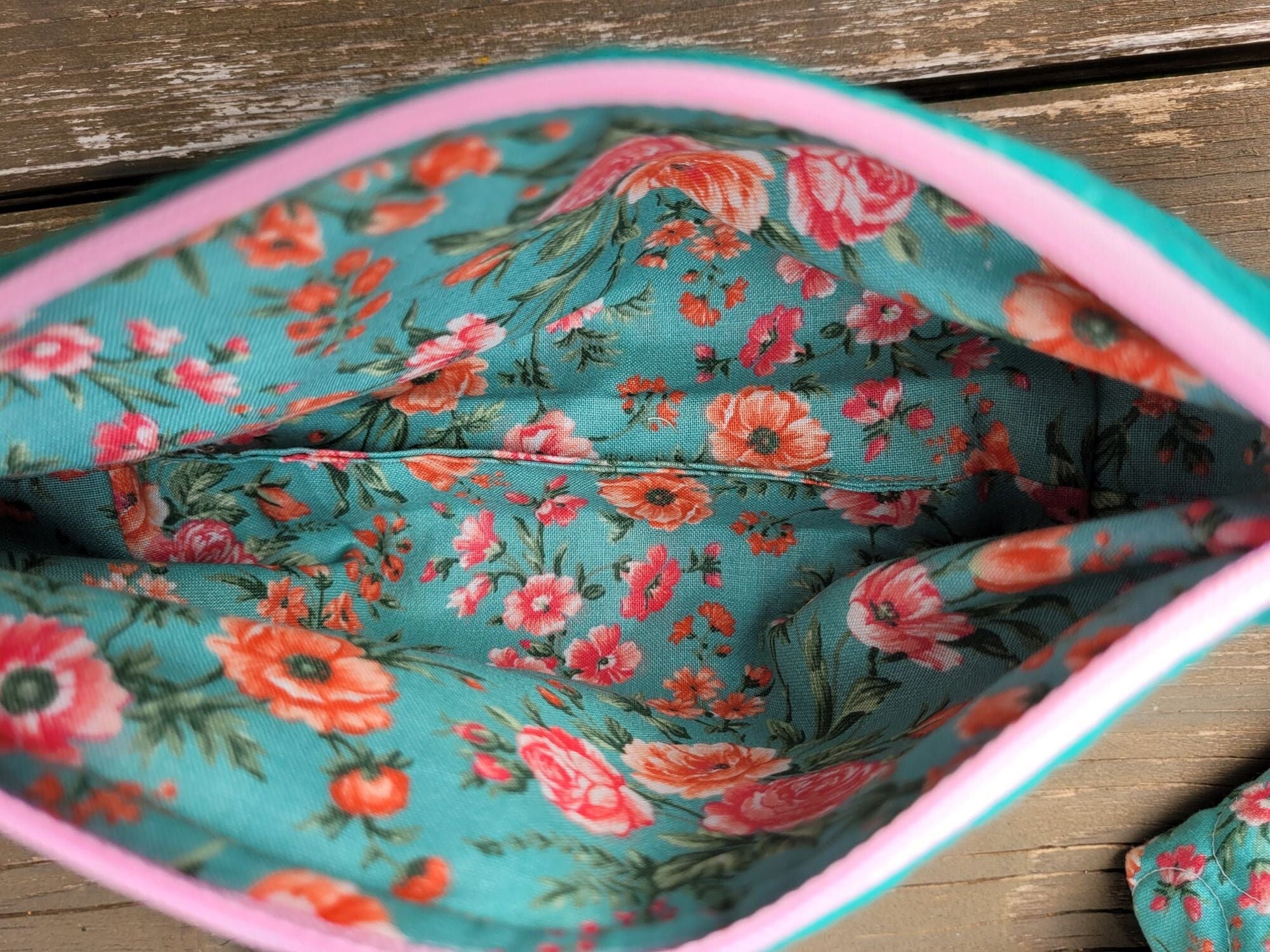 interior of teal pouch