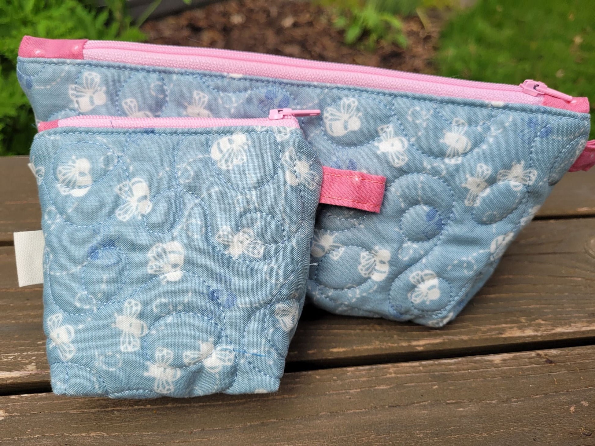 back view of small quilted bags