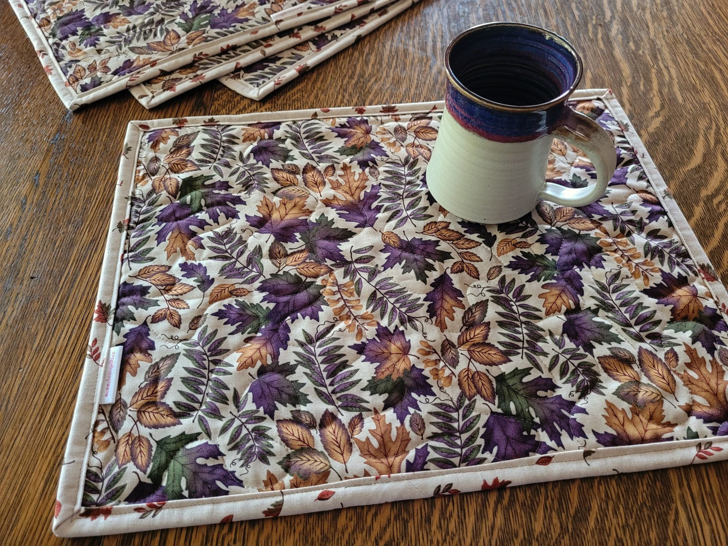 reverse side of quilted placemats in autumn leaves