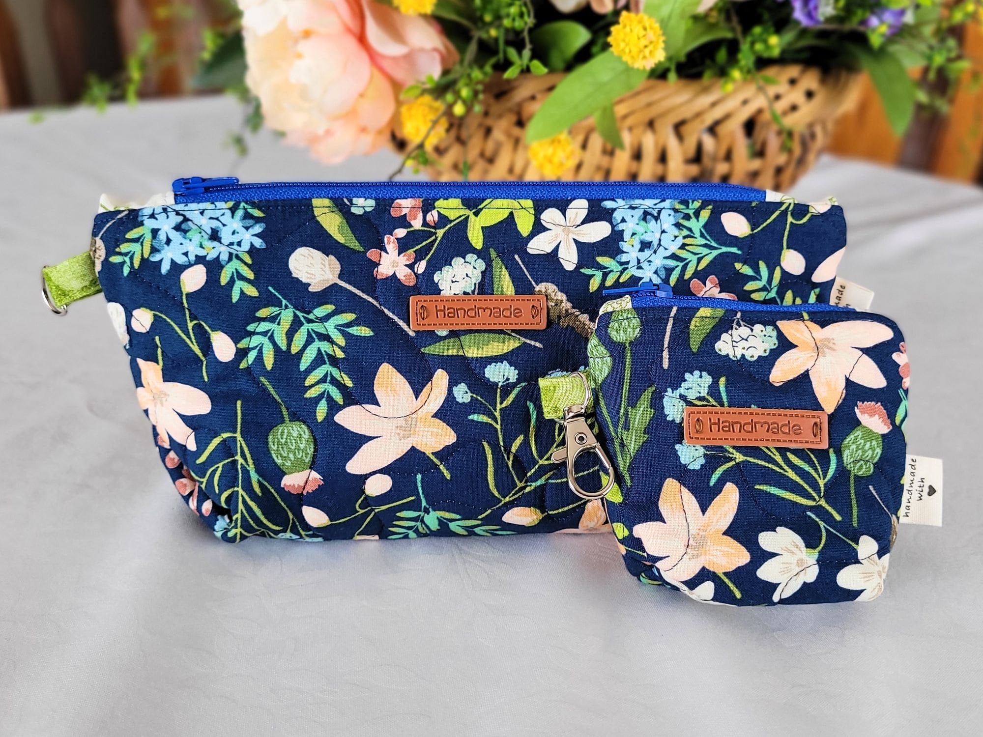 quilted zipper pouch in navy floral fabric