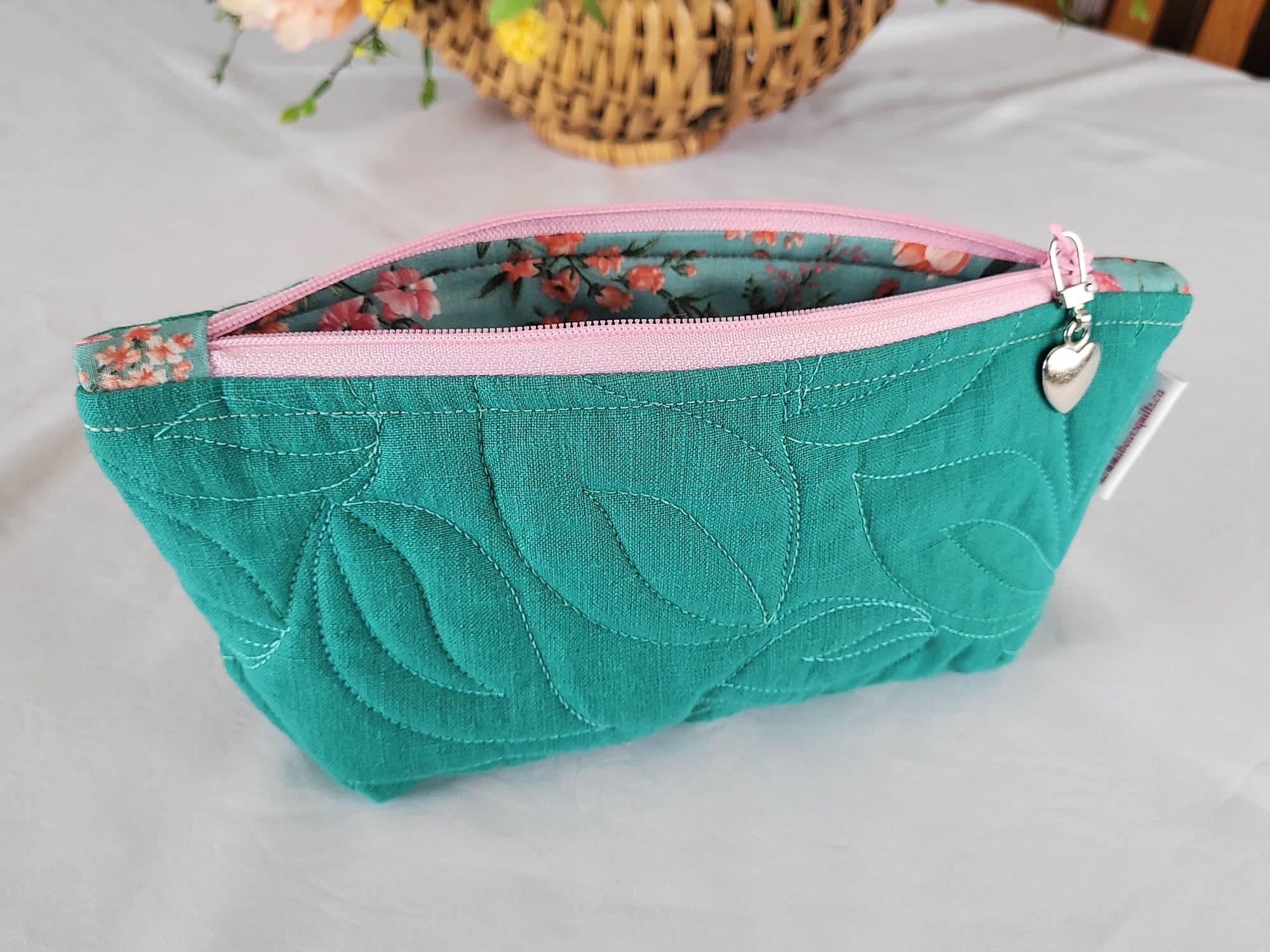 teal quilted cosmetic bag