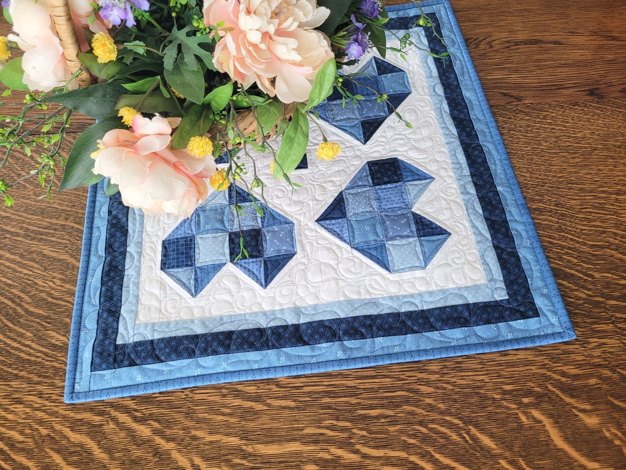 quilted table topper with patchwork hearts
