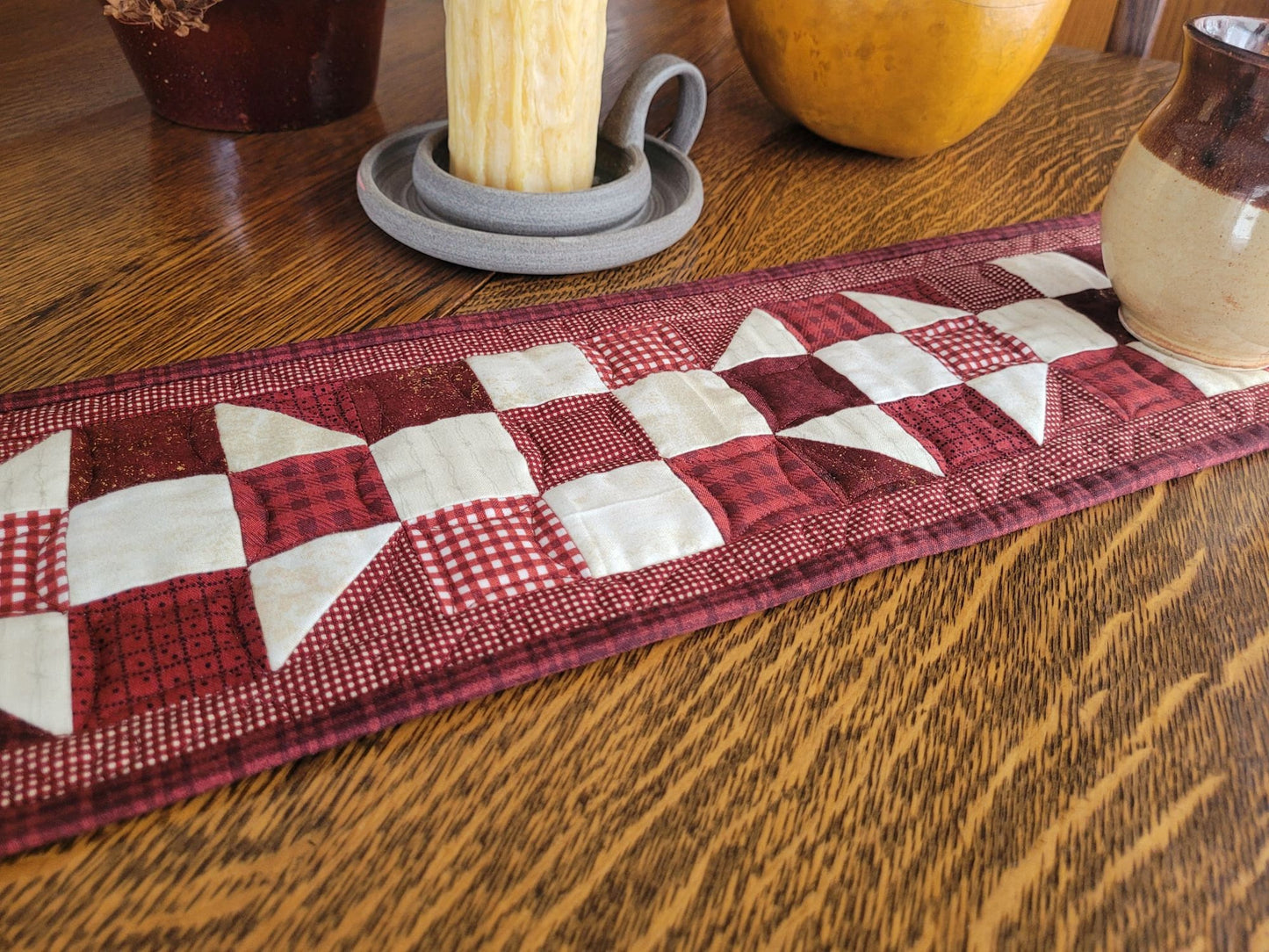 small scrap quilt in red and white patchwork